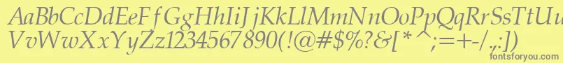 PalatinorItalic-fontti – harmaat kirjasimet keltaisella taustalla