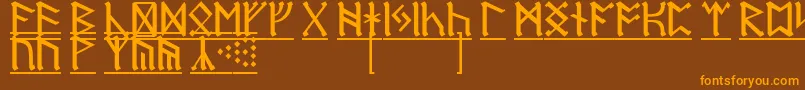 フォントRuneD1 – オレンジ色の文字が茶色の背景にあります。