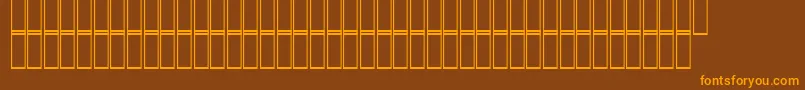 フォントAcsZomorrod – オレンジ色の文字が茶色の背景にあります。