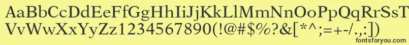 Newasterltstd Font – Black Fonts on Yellow Background