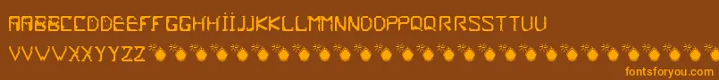 Fonte Frish – fontes laranjas em um fundo marrom