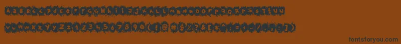 TpfKrikkelKrakkel Font – Black Fonts on Brown Background