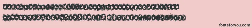 TpfKrikkelKrakkel-Schriftart – Schwarze Schriften auf rosa Hintergrund