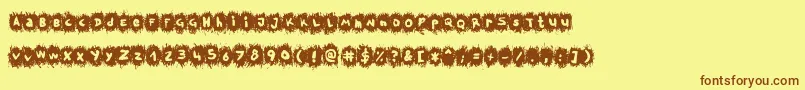 TpfKrikkelKrakkel Font – Brown Fonts on Yellow Background