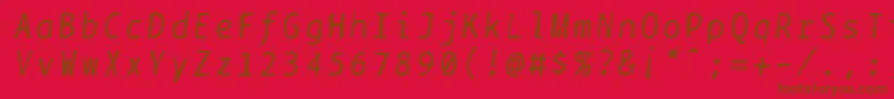 Fonte Bptypewritedamageditalics – fontes marrons em um fundo vermelho