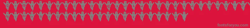 フォントLmsSpookySpeller – 赤い背景に灰色の文字