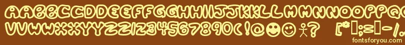 Plastb Font – Yellow Fonts on Brown Background