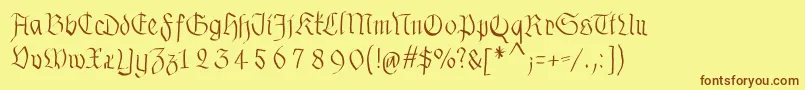 Fonte Fraxhandwritten – fontes marrons em um fundo amarelo