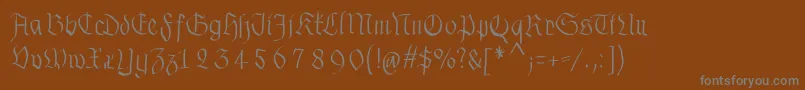 フォントFraxhandwritten – 茶色の背景に灰色の文字