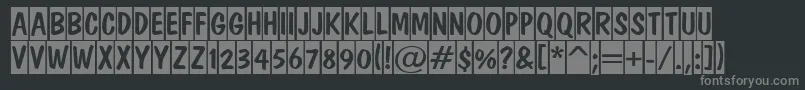 フォントADominotitulcm – 黒い背景に灰色の文字