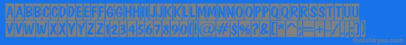 ADominotitulcm-Schriftart – Graue Schriften auf blauem Hintergrund