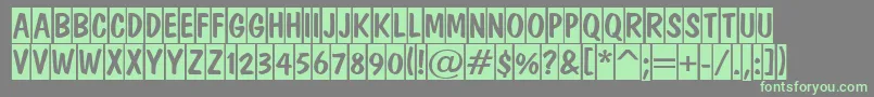 ADominotitulcm-Schriftart – Grüne Schriften auf grauem Hintergrund