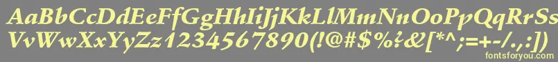 StempelSchneidlerLtBlackItalic-fontti – keltaiset fontit harmaalla taustalla