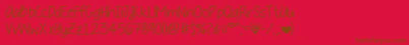 Daddysgirl-Schriftart – Braune Schriften auf rotem Hintergrund