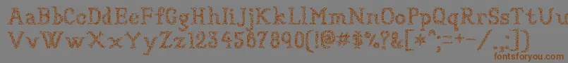 Шрифт Sundried – коричневые шрифты на сером фоне