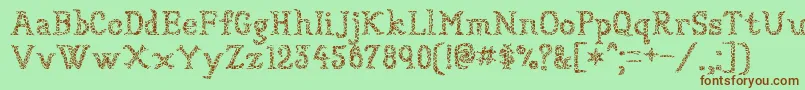 Sundried-Schriftart – Braune Schriften auf grünem Hintergrund
