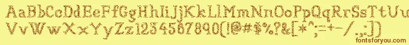 Sundried-Schriftart – Braune Schriften auf gelbem Hintergrund