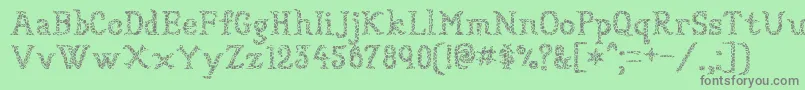 フォントSundried – 緑の背景に灰色の文字