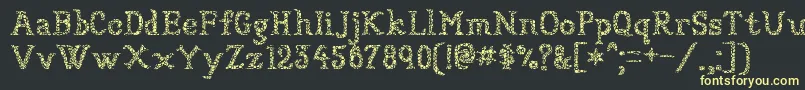 フォントSundried – 黒い背景に黄色の文字