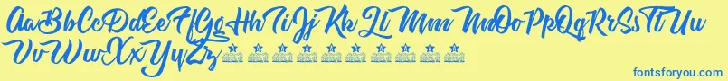 AstroveganPersonalUse-Schriftart – Blaue Schriften auf gelbem Hintergrund