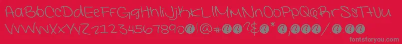 フォントInterconnecteddemoRegular – 赤い背景に灰色の文字