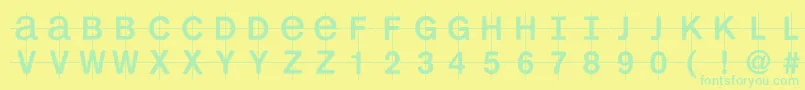 Kl1monocase Font – Green Fonts on Yellow Background