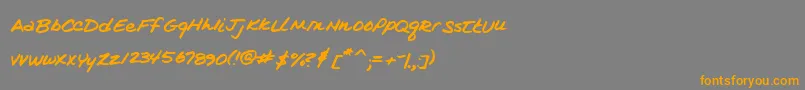 フォントKimsHandwriting – オレンジの文字は灰色の背景にあります。