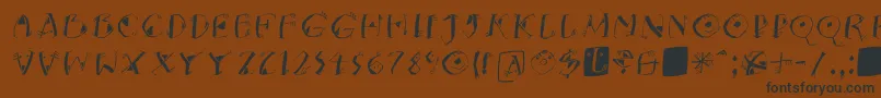 フォントKNeptunsItalic – 黒い文字が茶色の背景にあります