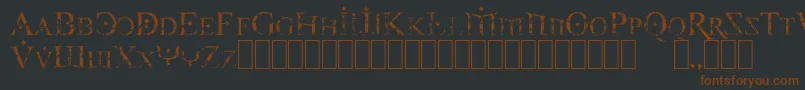 フォントFireOfYsgardCarvedInStone – 黒い背景に茶色のフォント