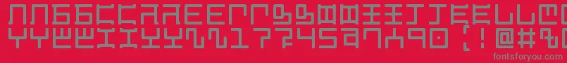 フォントMagzeticianRegular – 赤い背景に灰色の文字