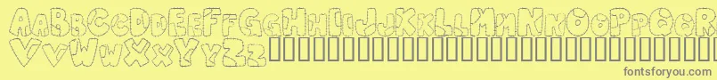 PatchworkLetter Font – Gray Fonts on Yellow Background