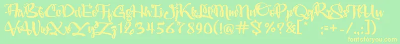 Audrey Font – Yellow Fonts on Green Background