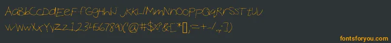 Шрифт CocoHand – оранжевые шрифты на чёрном фоне