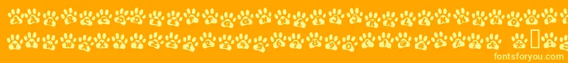 EnnobledPet Font – Yellow Fonts on Orange Background