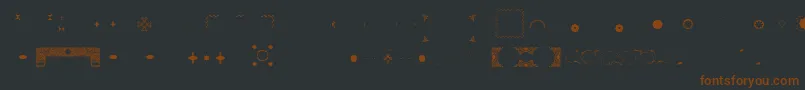 Czcionka Pfornmtreasures3Layer4 – brązowe czcionki na czarnym tle