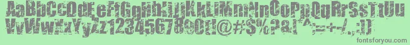 Smudgers Font – Gray Fonts on Green Background