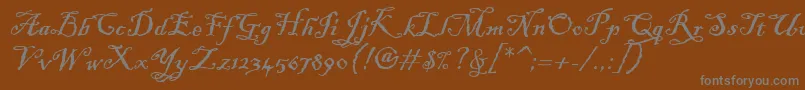 フォントBlackadderItc – 茶色の背景に灰色の文字