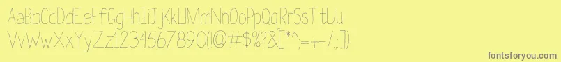 フォントLaterOn – 黄色の背景に灰色の文字