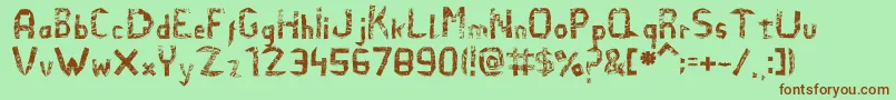 Шрифт Elefidearena – коричневые шрифты на зелёном фоне