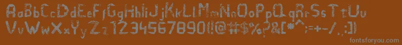 Elefidearena-fontti – harmaat kirjasimet ruskealla taustalla