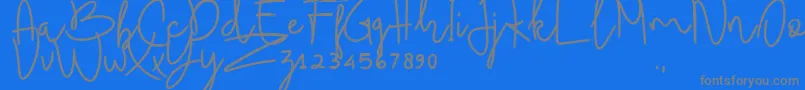 fuente BudhayantiScript – Fuentes Grises Sobre Fondo Azul