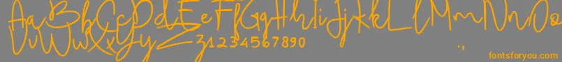 BudhayantiScript Font – Orange Fonts on Gray Background