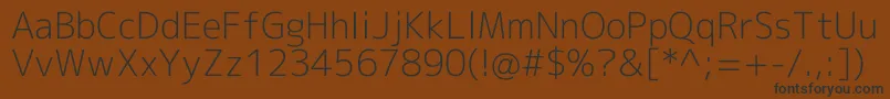 Mplus2cLightEn Font – Black Fonts on Brown Background