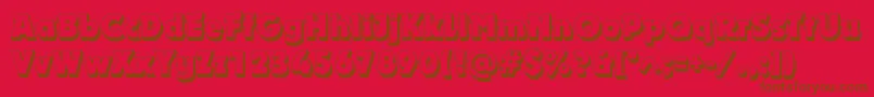 Dynarshadowc-Schriftart – Braune Schriften auf rotem Hintergrund