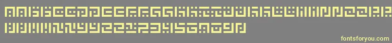 SymvolaUno Font – Yellow Fonts on Gray Background