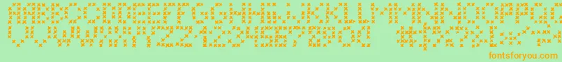LcEmbroidery Font – Orange Fonts on Green Background