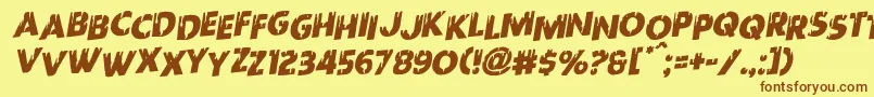 フォントRedundeadstaggeredrotal – 茶色の文字が黄色の背景にあります。