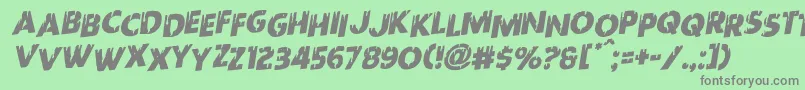 Redundeadstaggeredrotal-Schriftart – Graue Schriften auf grünem Hintergrund