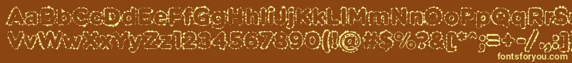 PabellonaBDuplex-fontti – keltaiset fontit ruskealla taustalla