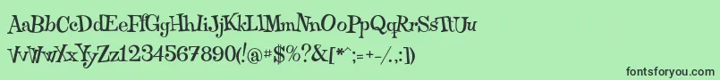 Qraxy Font – Black Fonts on Green Background